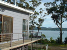 White Beach Cottage - Southport Accommodation 0