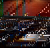 Dog and Monocle - Southport Accommodation