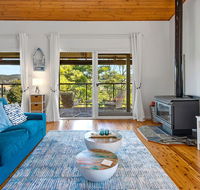 Stylish Renovated Home - Ocean Views - Fireplace - Southport Accommodation