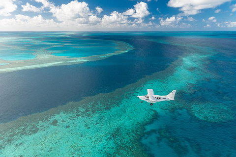 Great Barrier Reef Scenic Flight And Ocean Rafting Whitehaven Beach Day Trip - Accommodation Southport 3